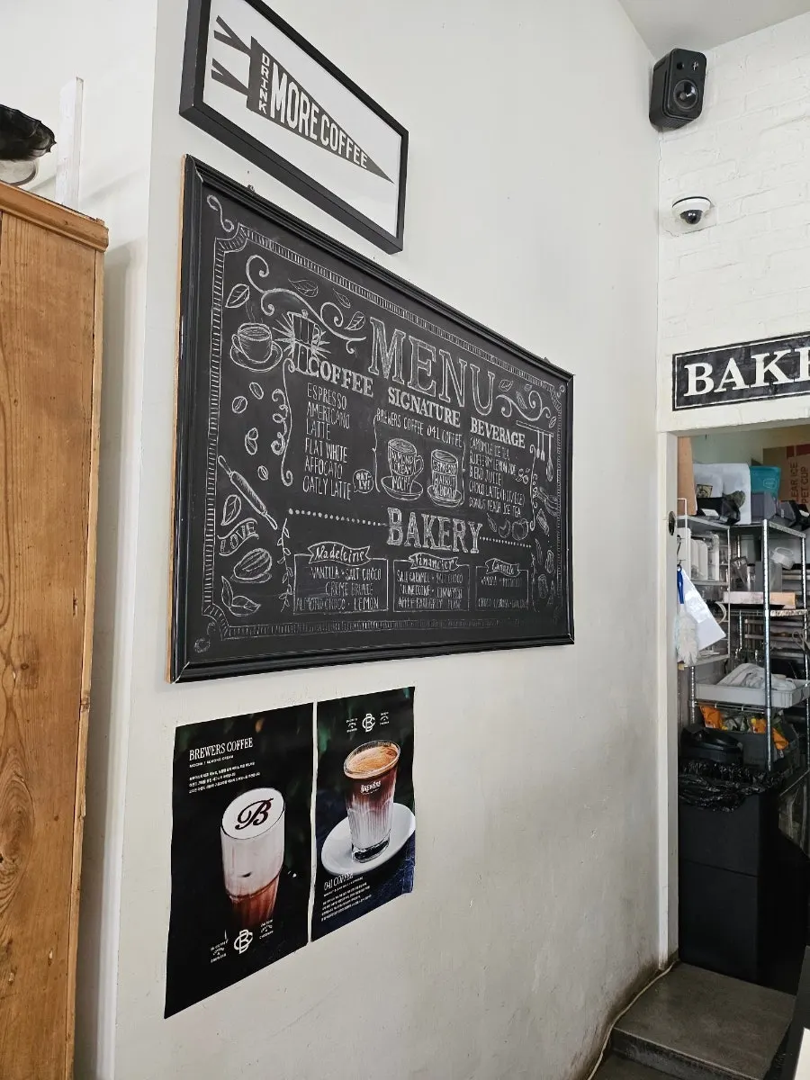 Spacious interior seating at Brewers Coffee Sinbu Branch
