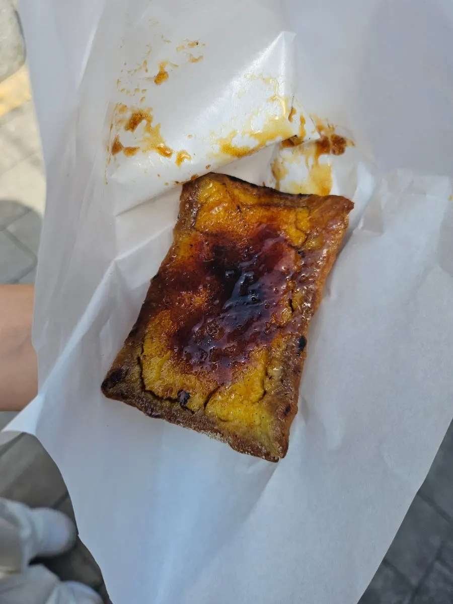 Takeout iced americano and a bag of desserts