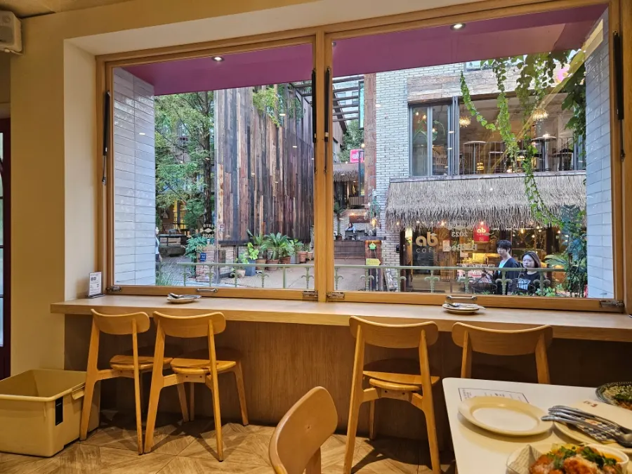 Bar table seating facing the kitchen