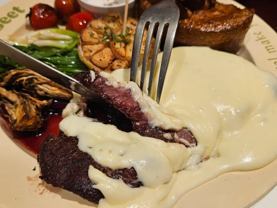 The cheese-covered skirt steak visual