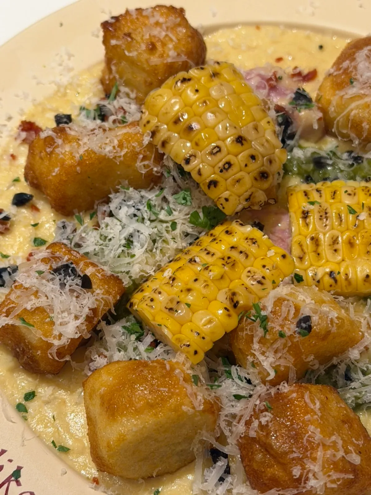 A big chunk of bacon hiding among the gnocchi