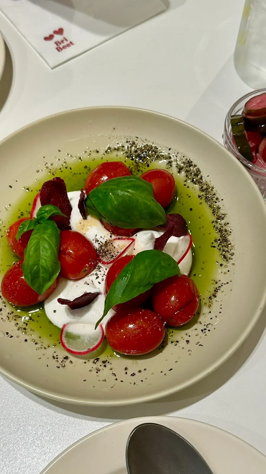 The tomato salad, first to arrive