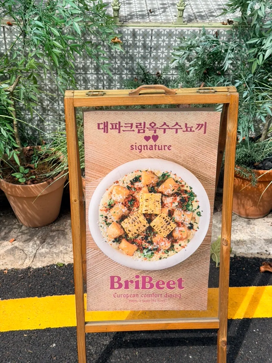 Sign introducing the corn cream gnocchi in front of the restaurant