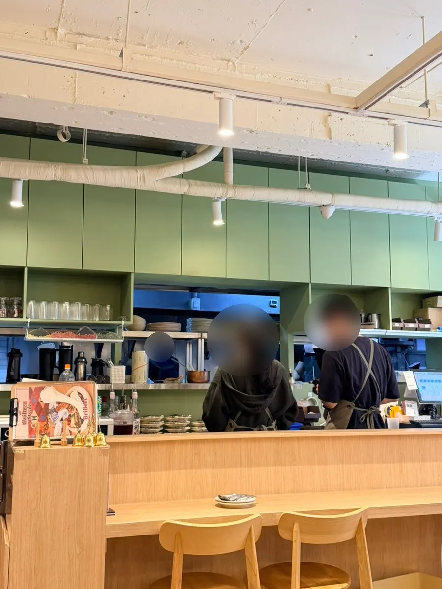 Interior of Brivit with the open kitchen visible near the entrance