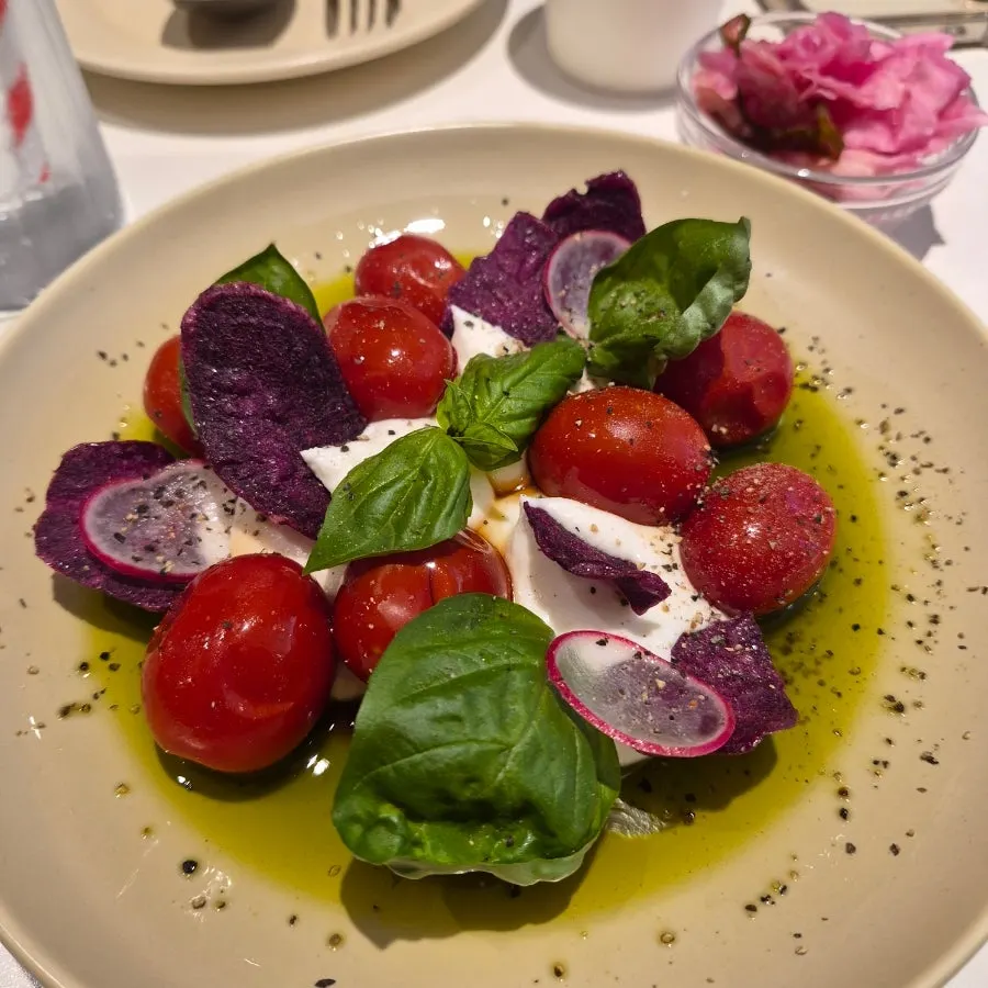 Salad with cherry tomatoes, Greek yogurt, and basil