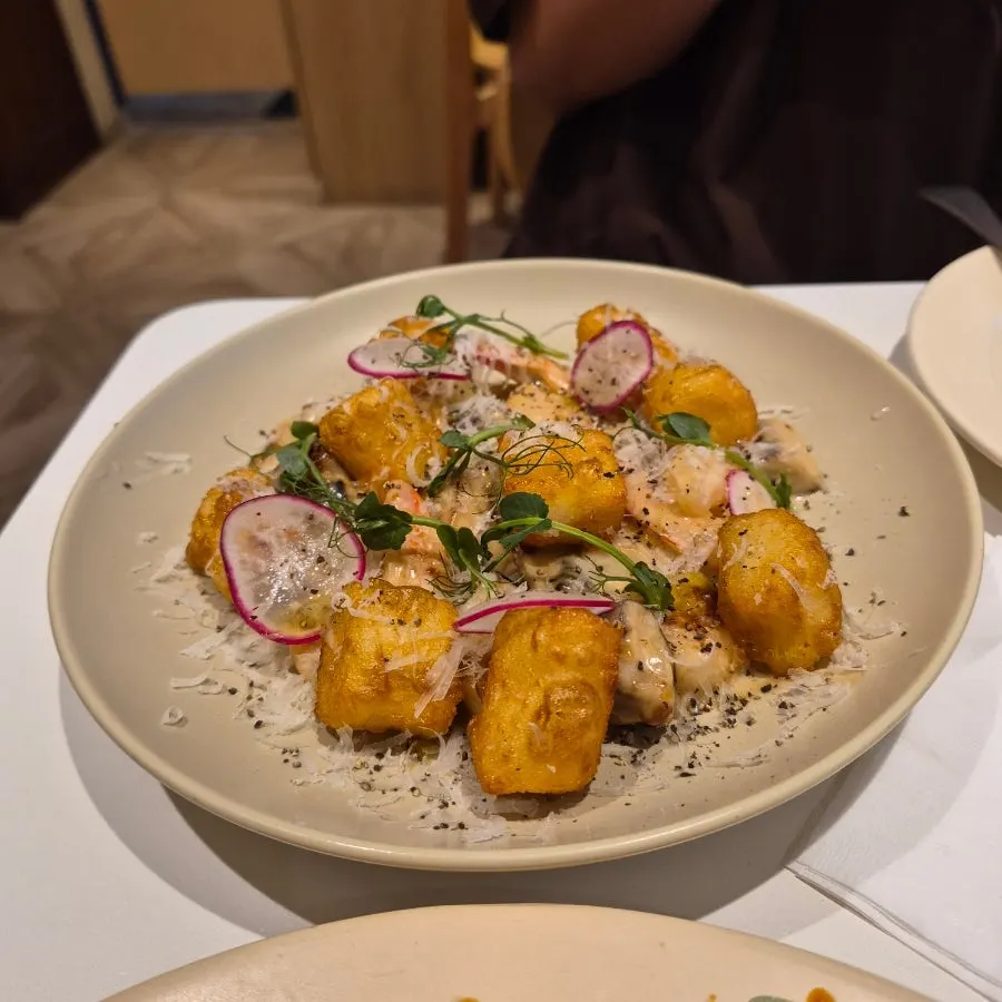 Close-up of golden pan-seared handmade gnocchi