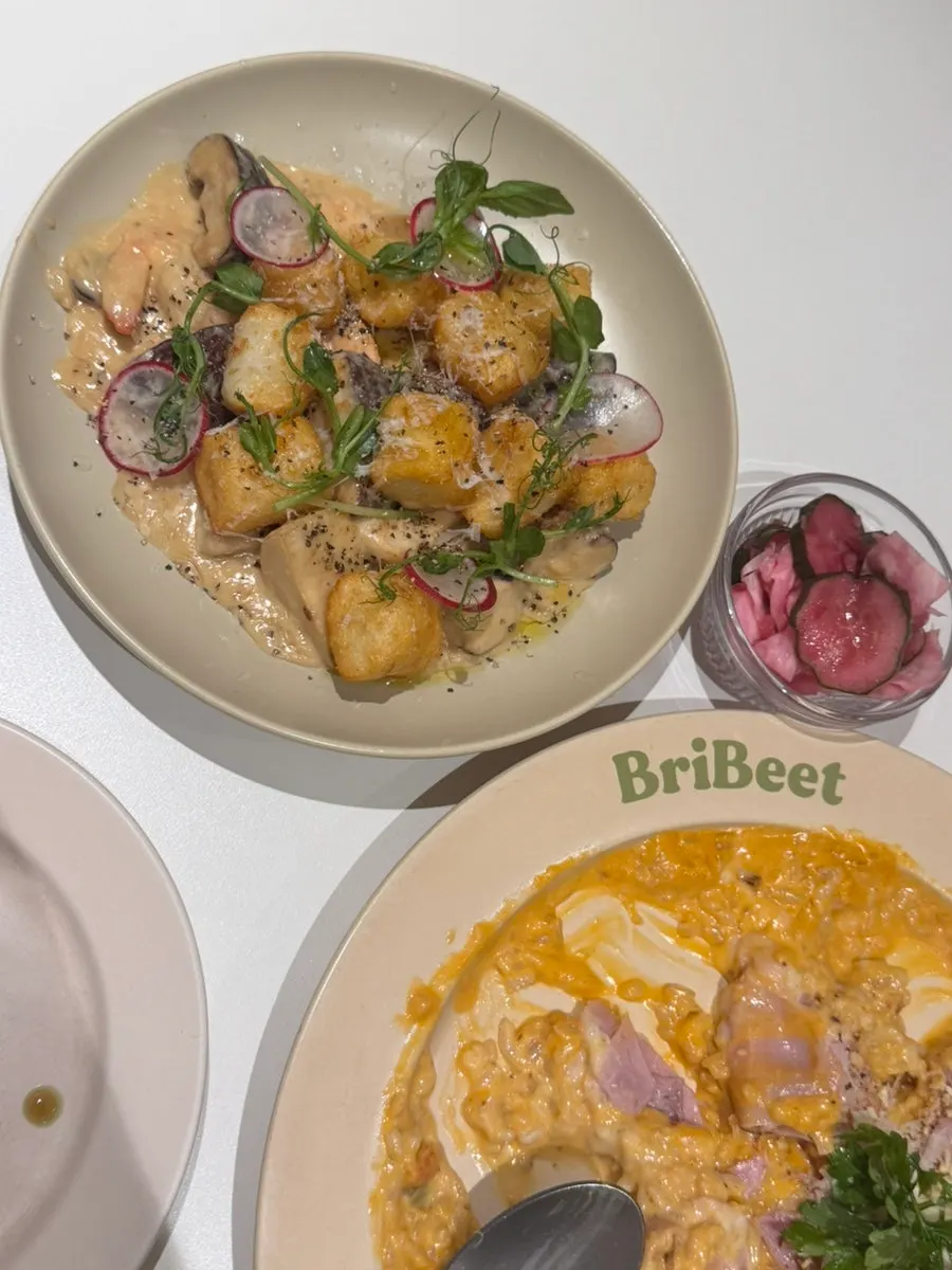 Spicy jambon risotto mixed and scooped up