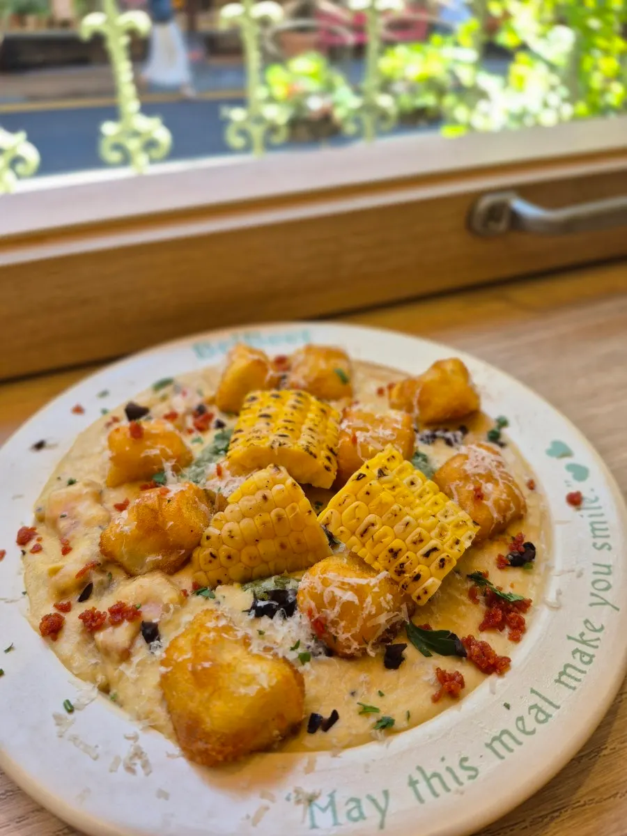 Handmade gnocchi tossed in green onion cream sauce