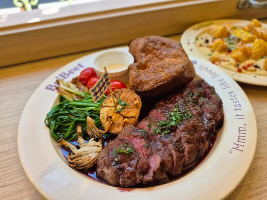 Signature steak before the Aligot cheese pour
