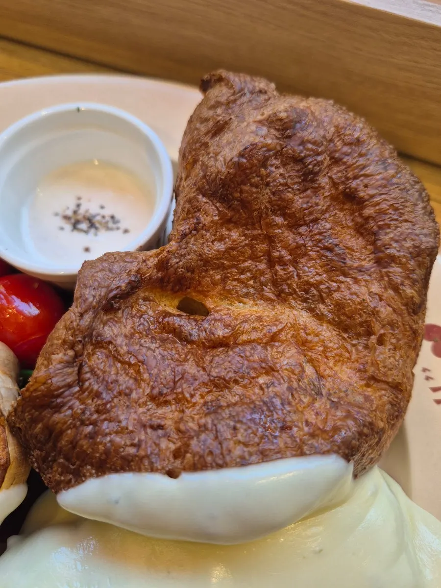 Crispy bread served alongside the steak