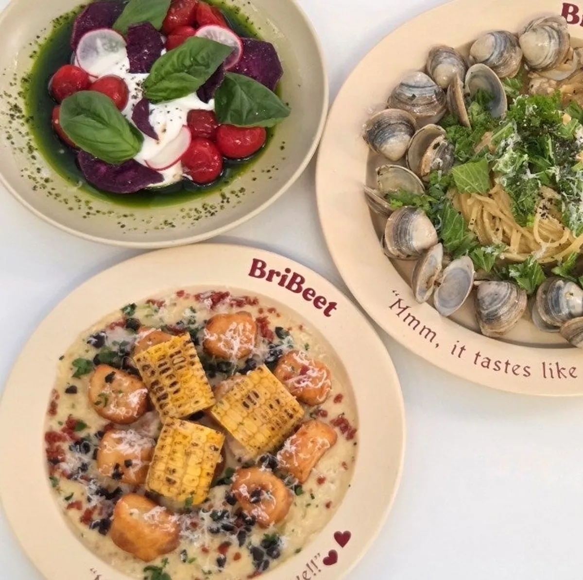 Full table setting of the Beet Set for two