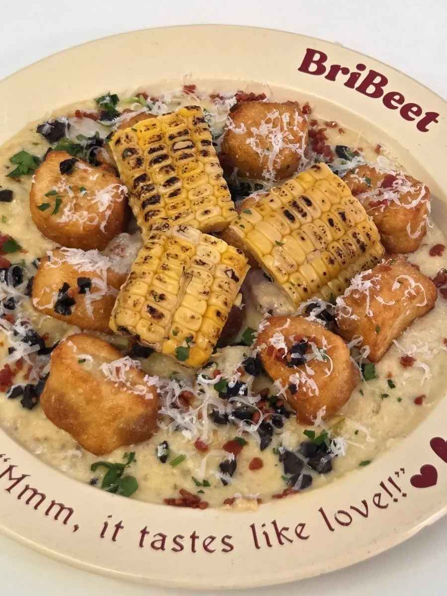 A plate of green onion cream corn gnocchi