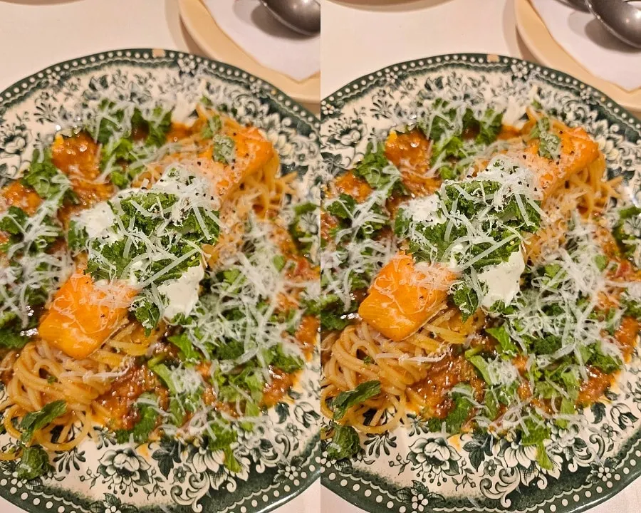 Salmon steak pasta topped with salmon