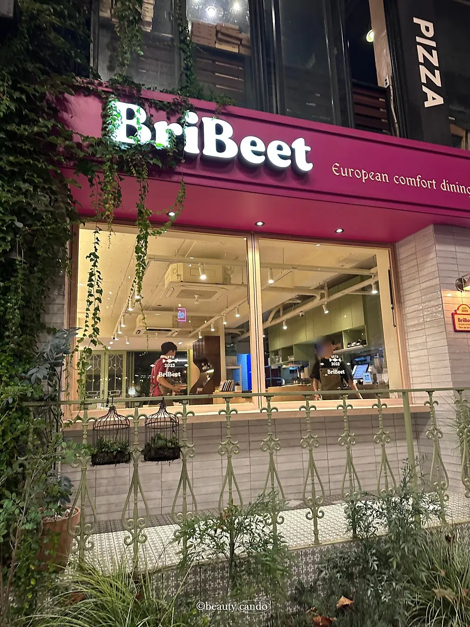Pink-toned exterior of Brivit Gangnam Station