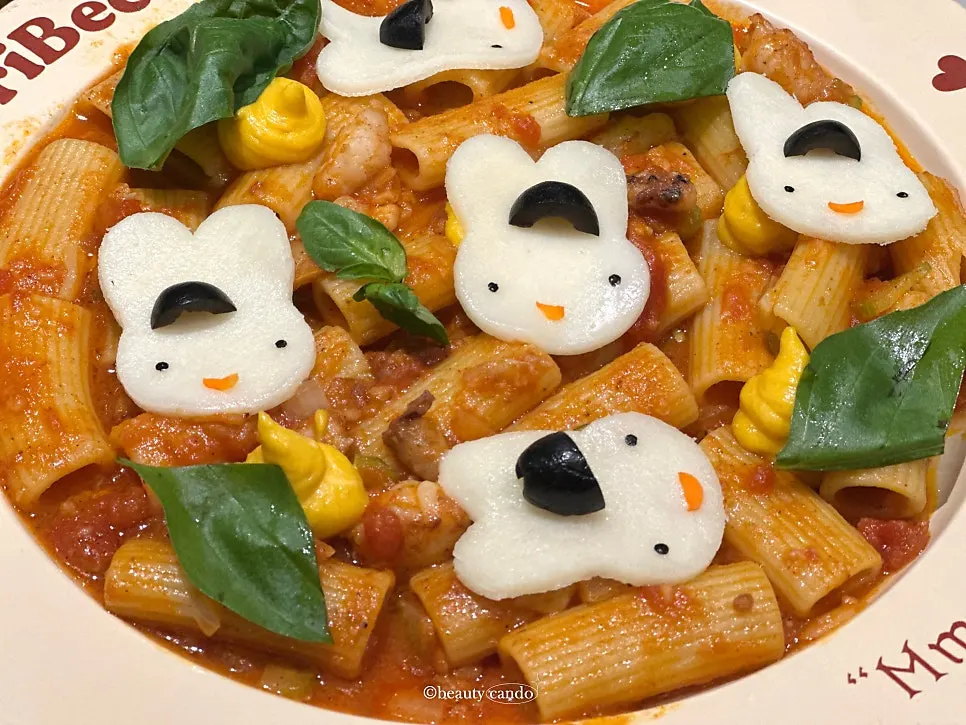 Rabbit pasta with shrimp and squid in tomato base