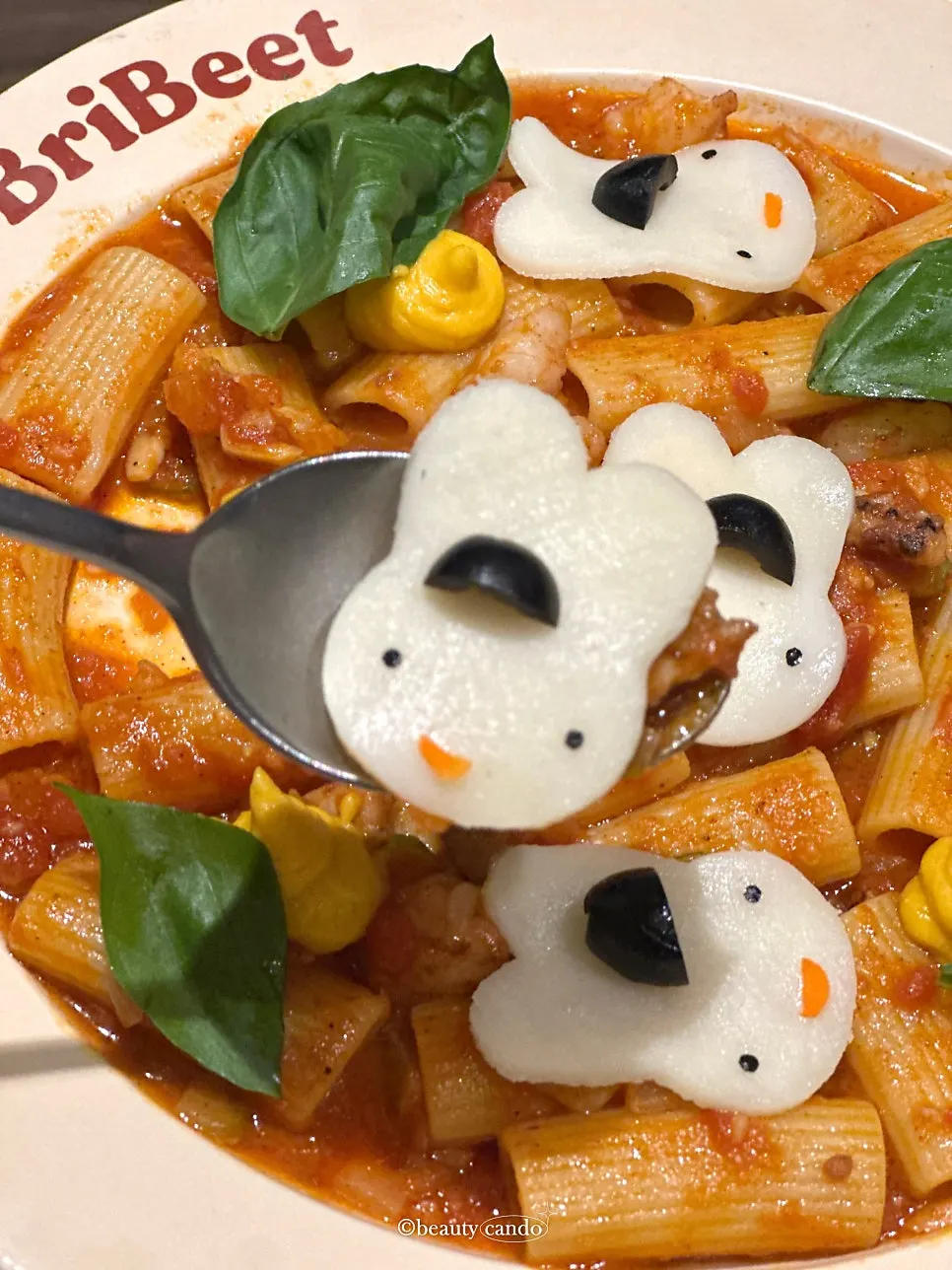 A portion of the not-spicy rabbit pasta plated aside