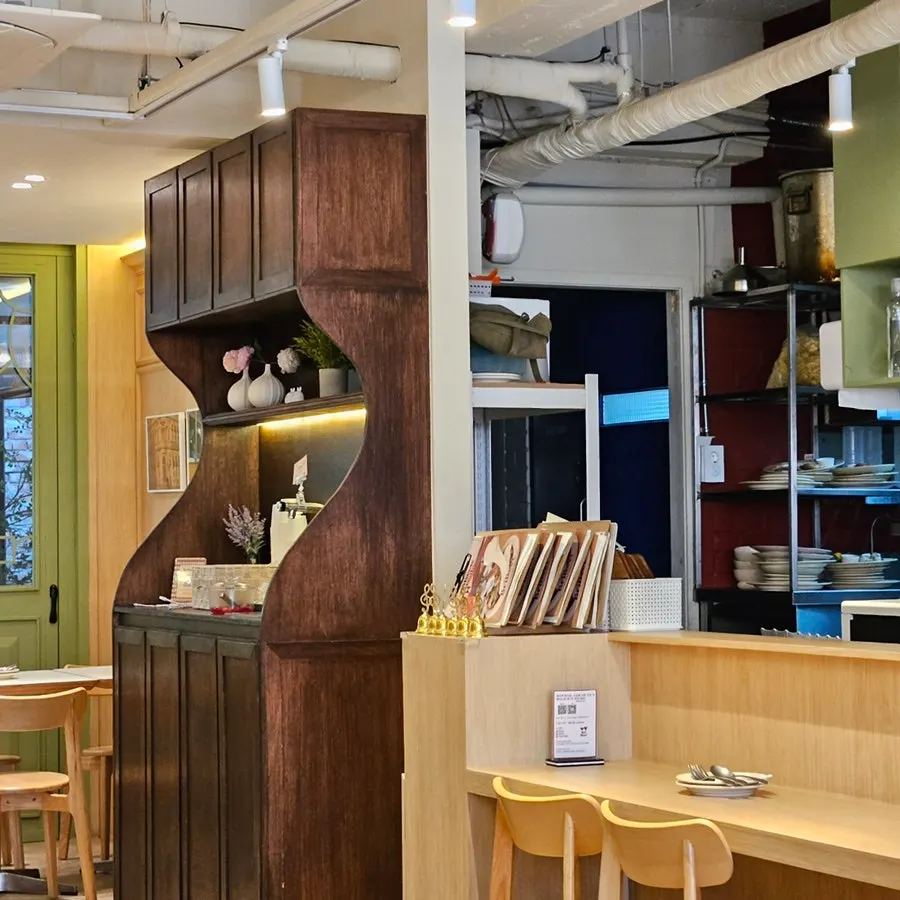 Plant-filled indoor seating at Brivit Gangnam