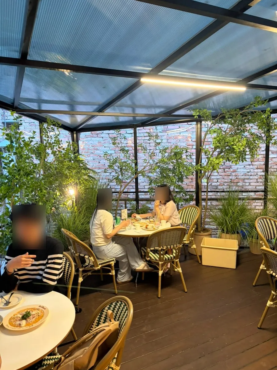 Semi-outdoor terrace-style seating inside Brivit