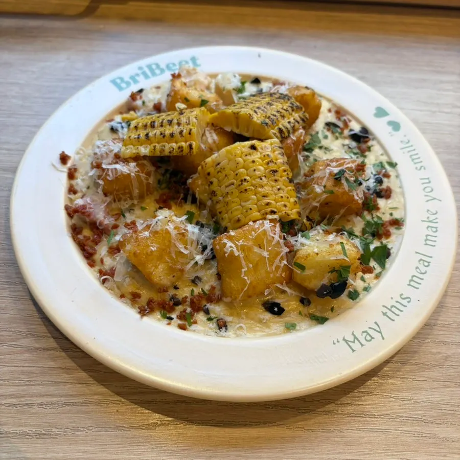 Table spread with gnocchi, pasta, and fried eggplant order