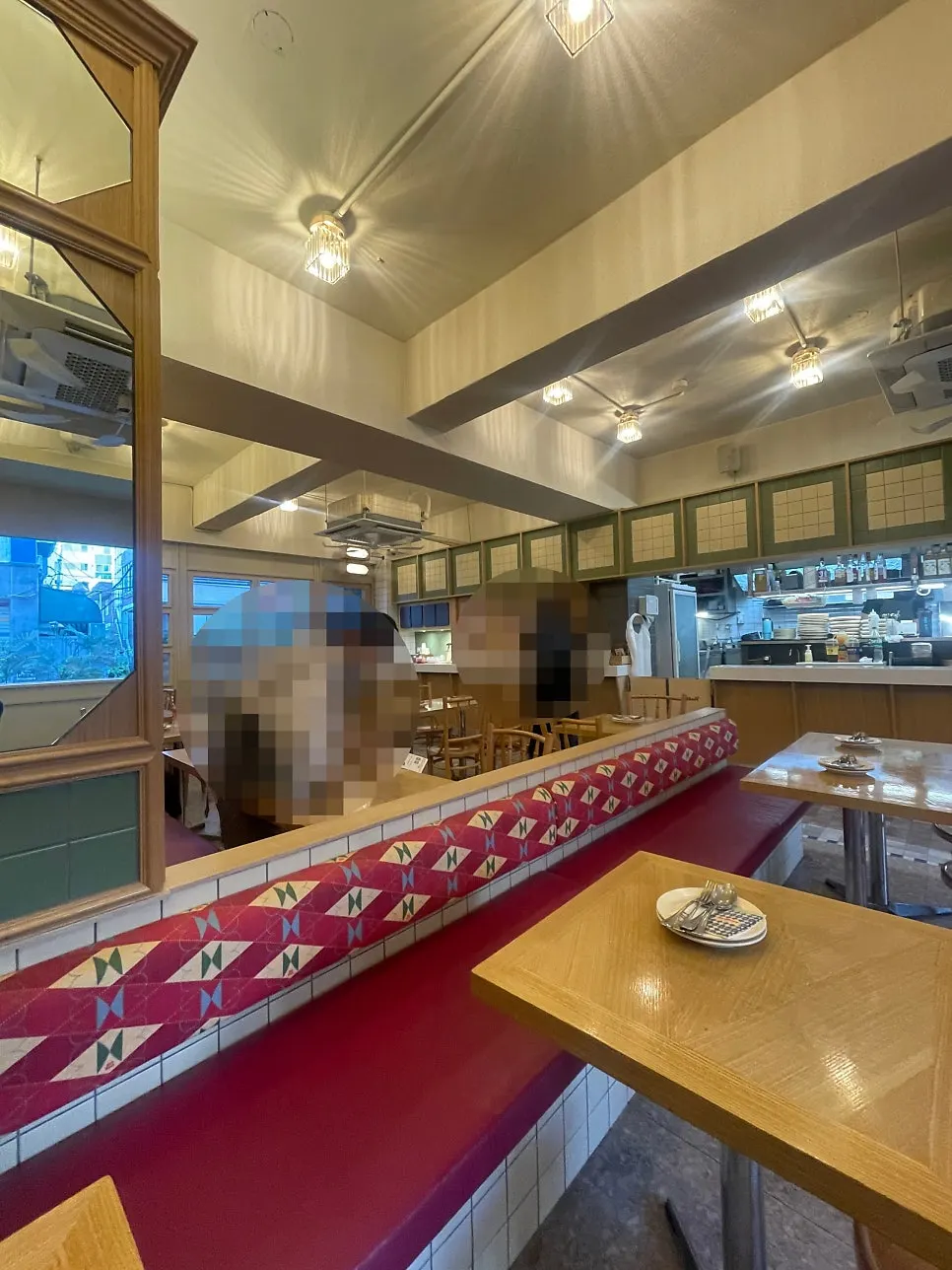Interior with tables for two and four