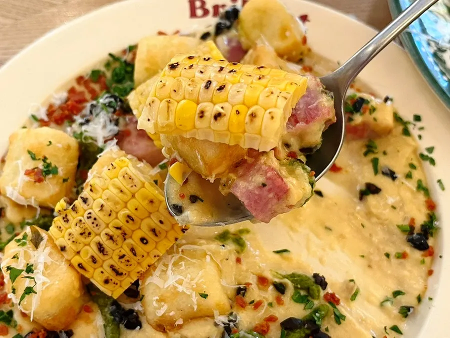 A bowl of scallion cream corn gnocchi