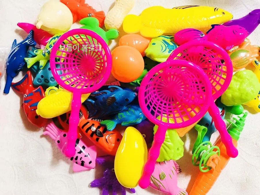 Brightly colored fishing play toy