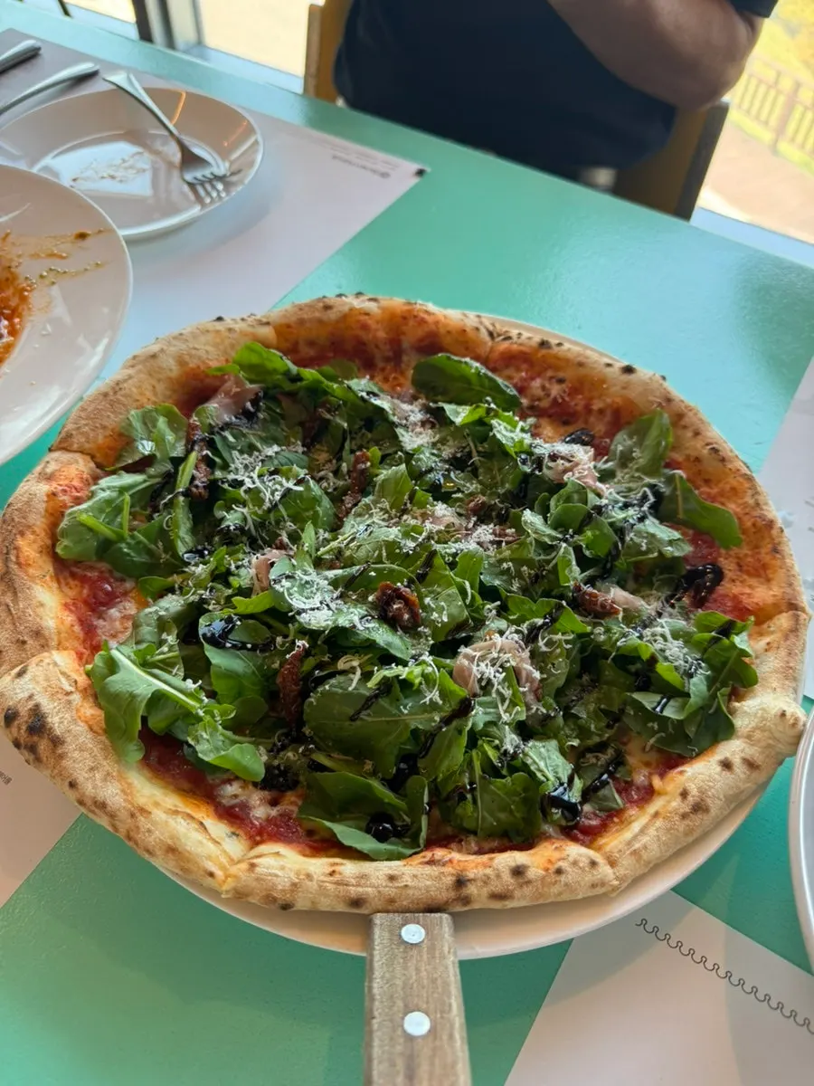 Wood-fired Margherita pizza