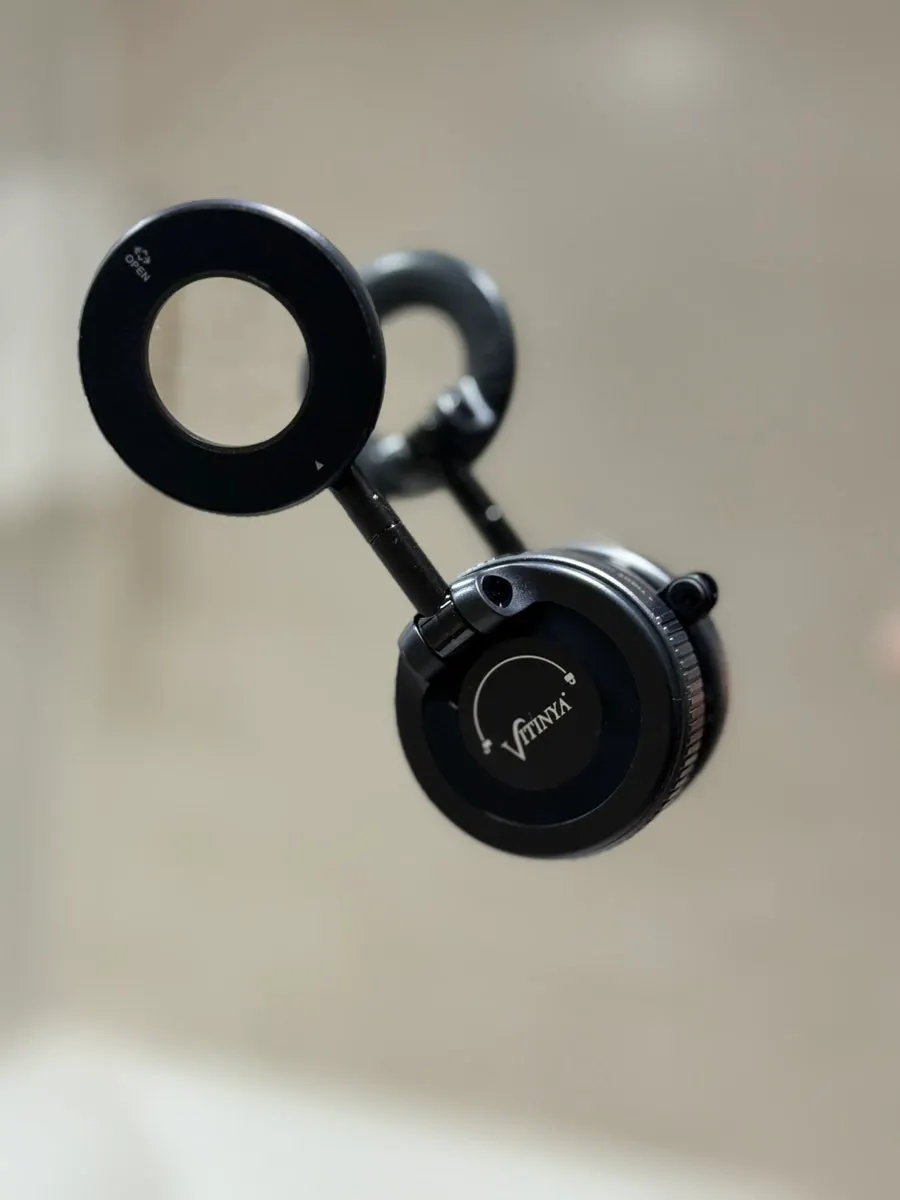 Smartphone mount attached to bathroom glass