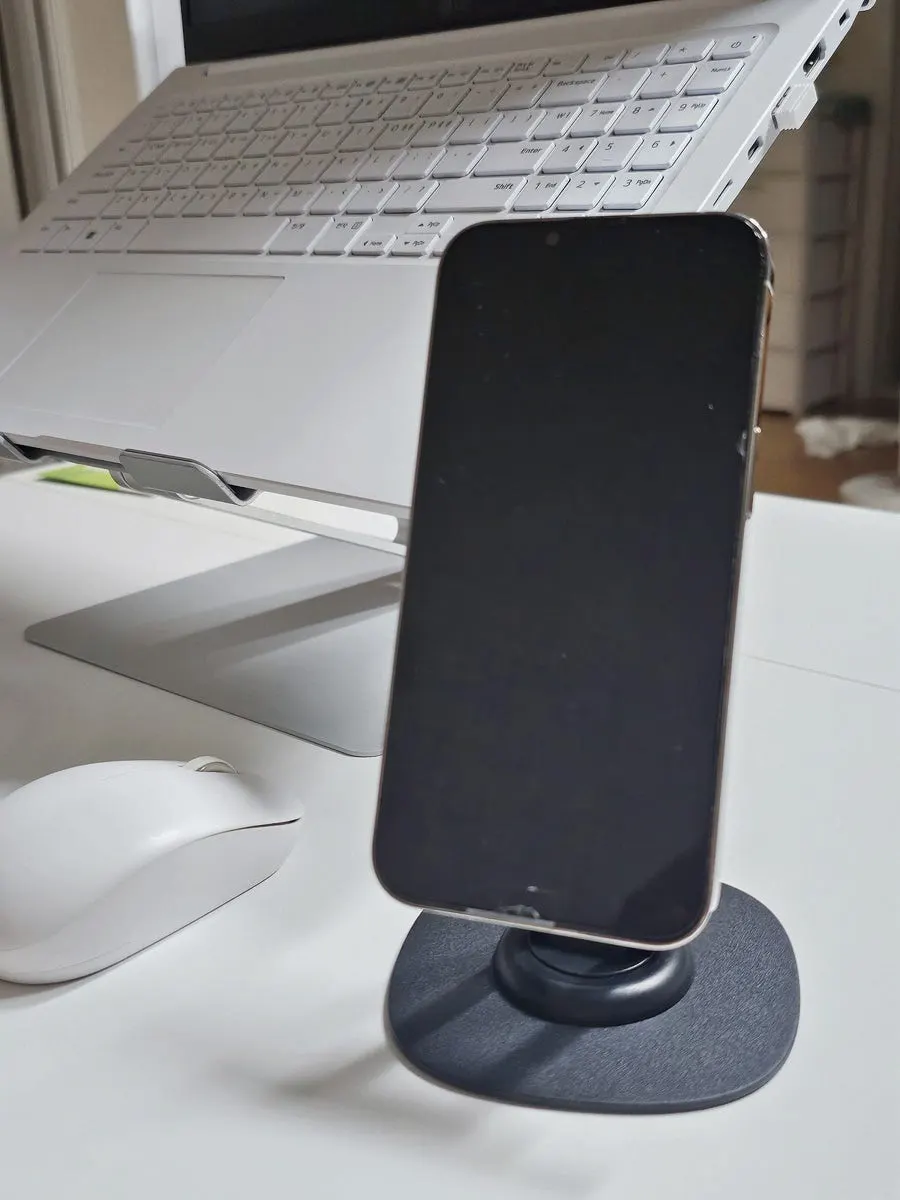 Stand with adjustable height and angle