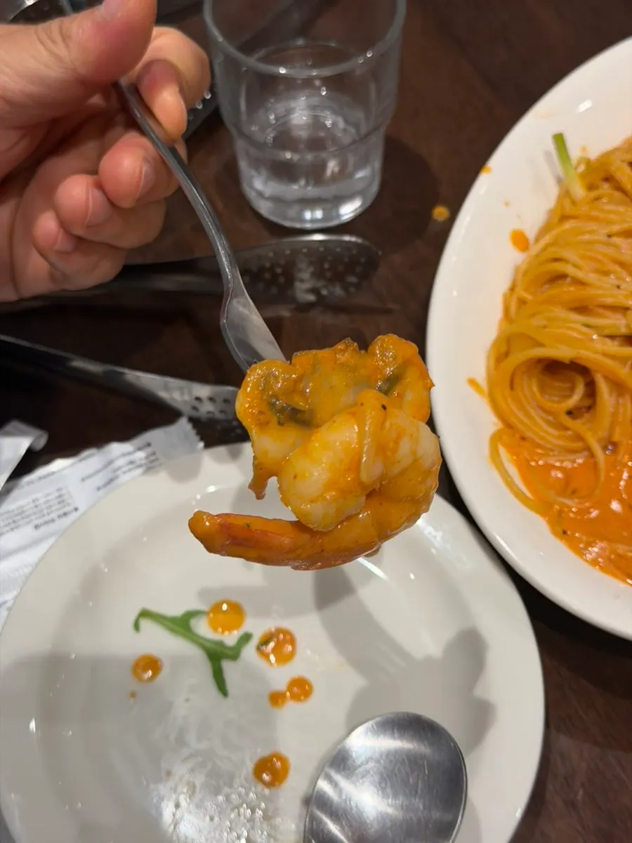 Shrimp rose pasta topped with mushrooms and shrimp