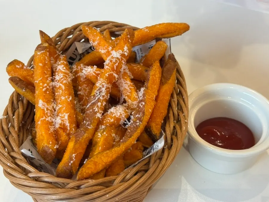 Cheese-topped sweet potato fries