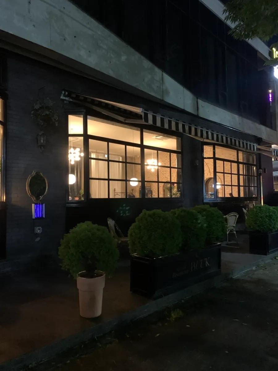 Building exterior of Bueokgan Sangmu Branch in the evening