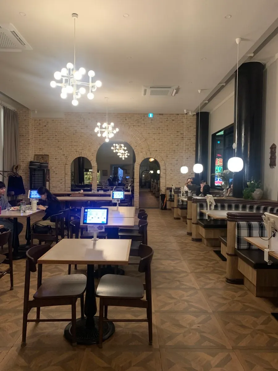 Interior of Bueokgan Sangmu Branch with a Rome hotel concept