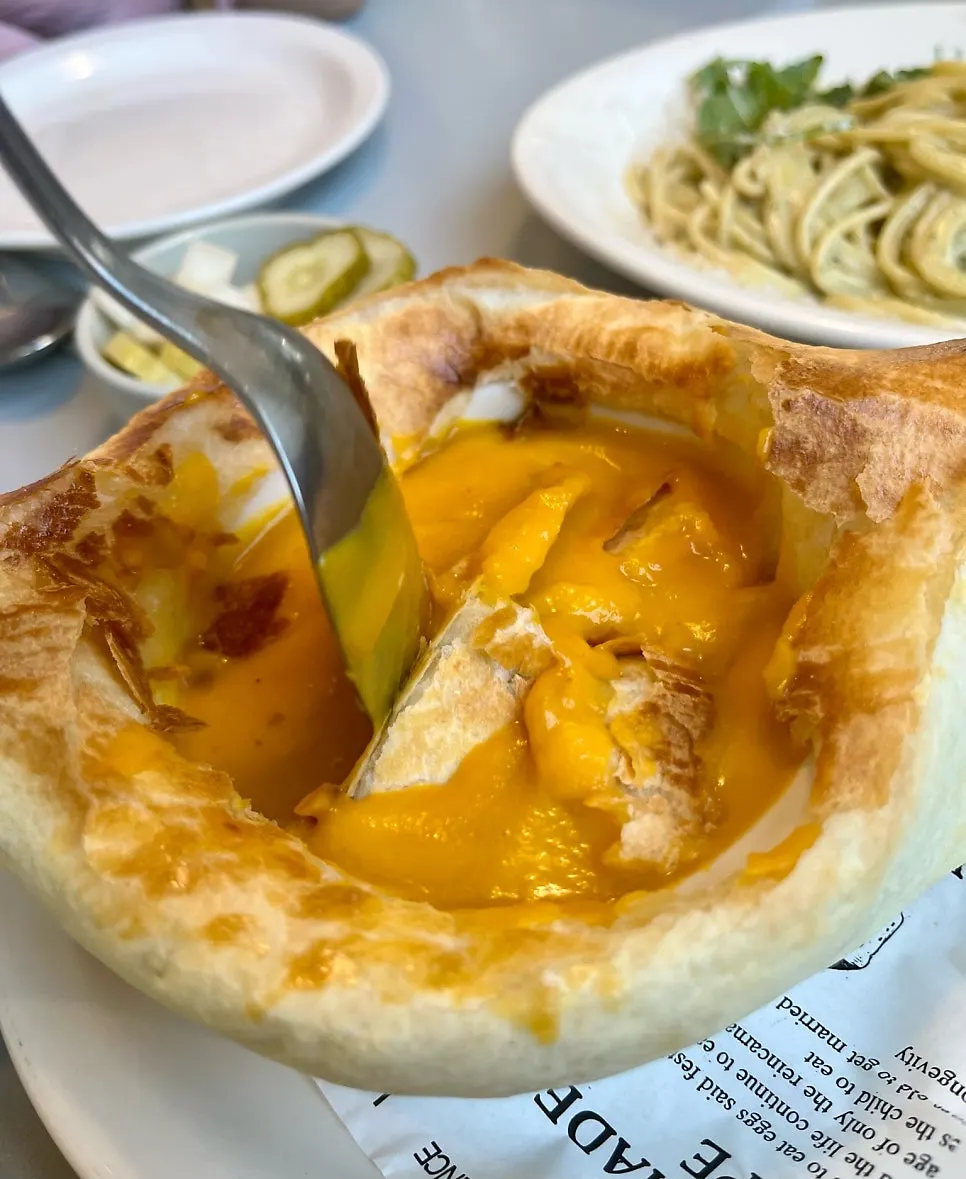 Cross-section of the well-baked pastry and pumpkin soup
