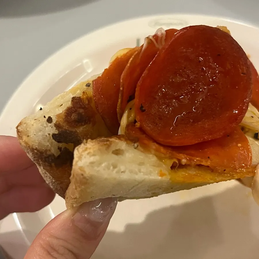 Cross-section of the pepperoni pizza dough