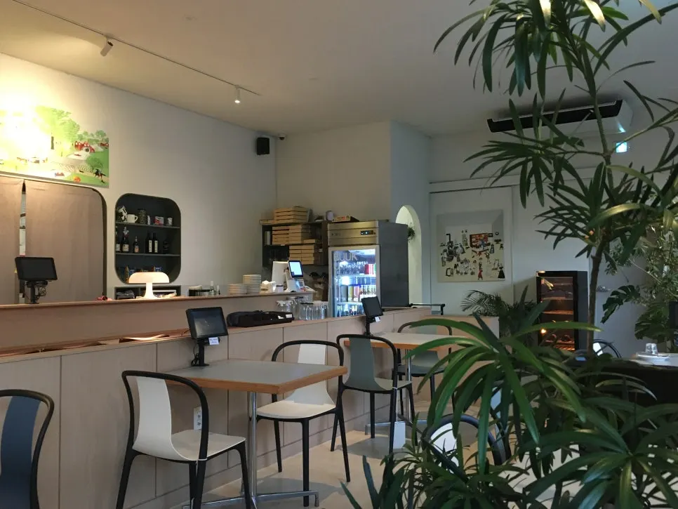 Interior view with window-side tables