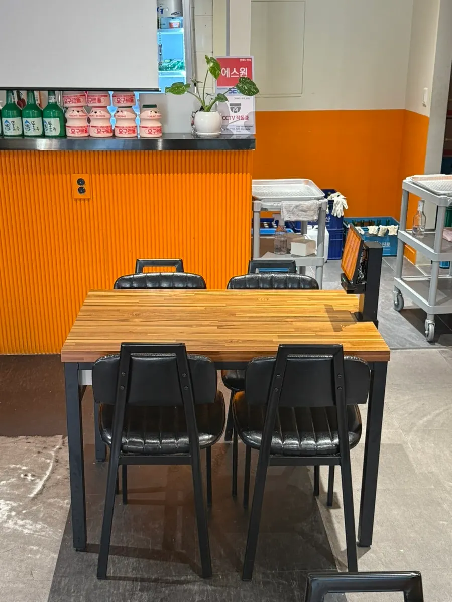 Seating area with tables inside the restaurant