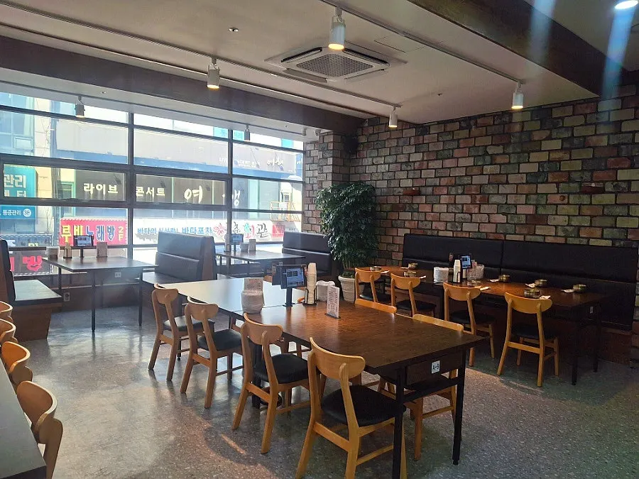 Spacious dining hall interior with plants