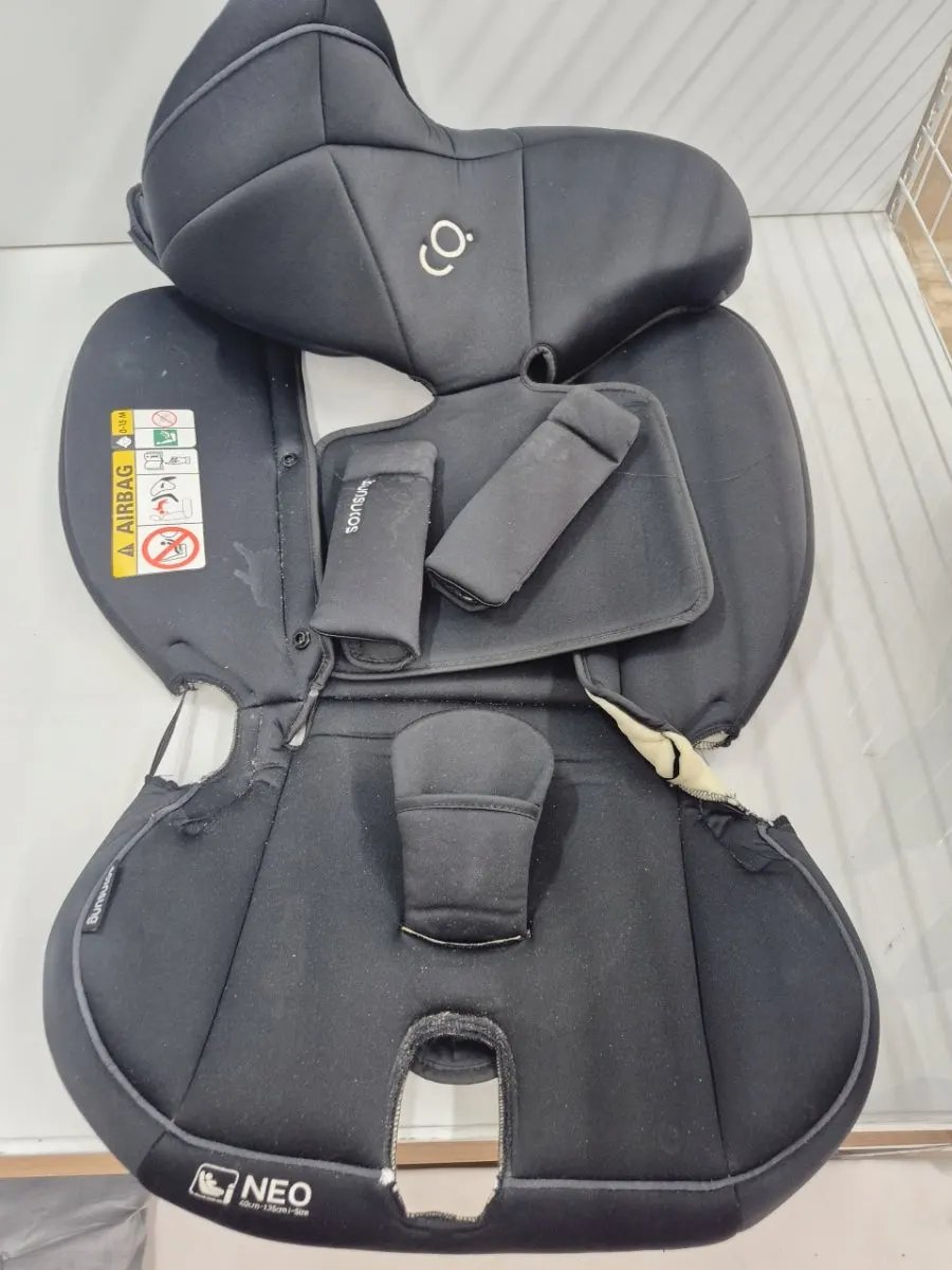 Car seat left outside the door waiting for pickup