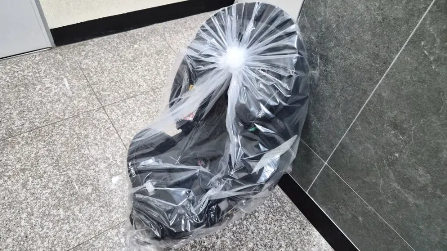 Packaged car seat delivered back to the doorstep