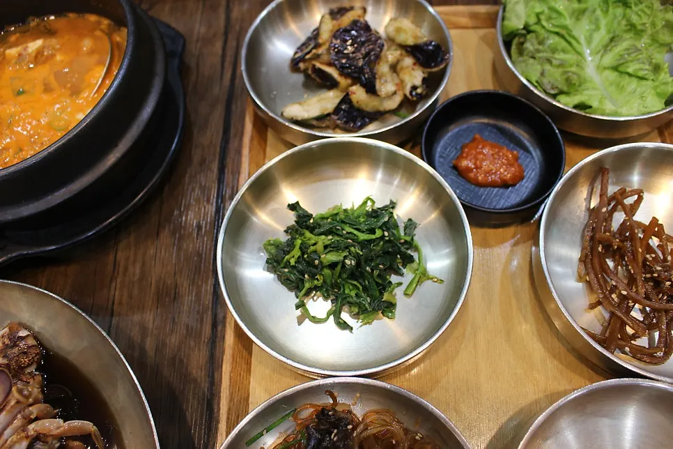 Seasoned vegetable banchan and japchae side dishes