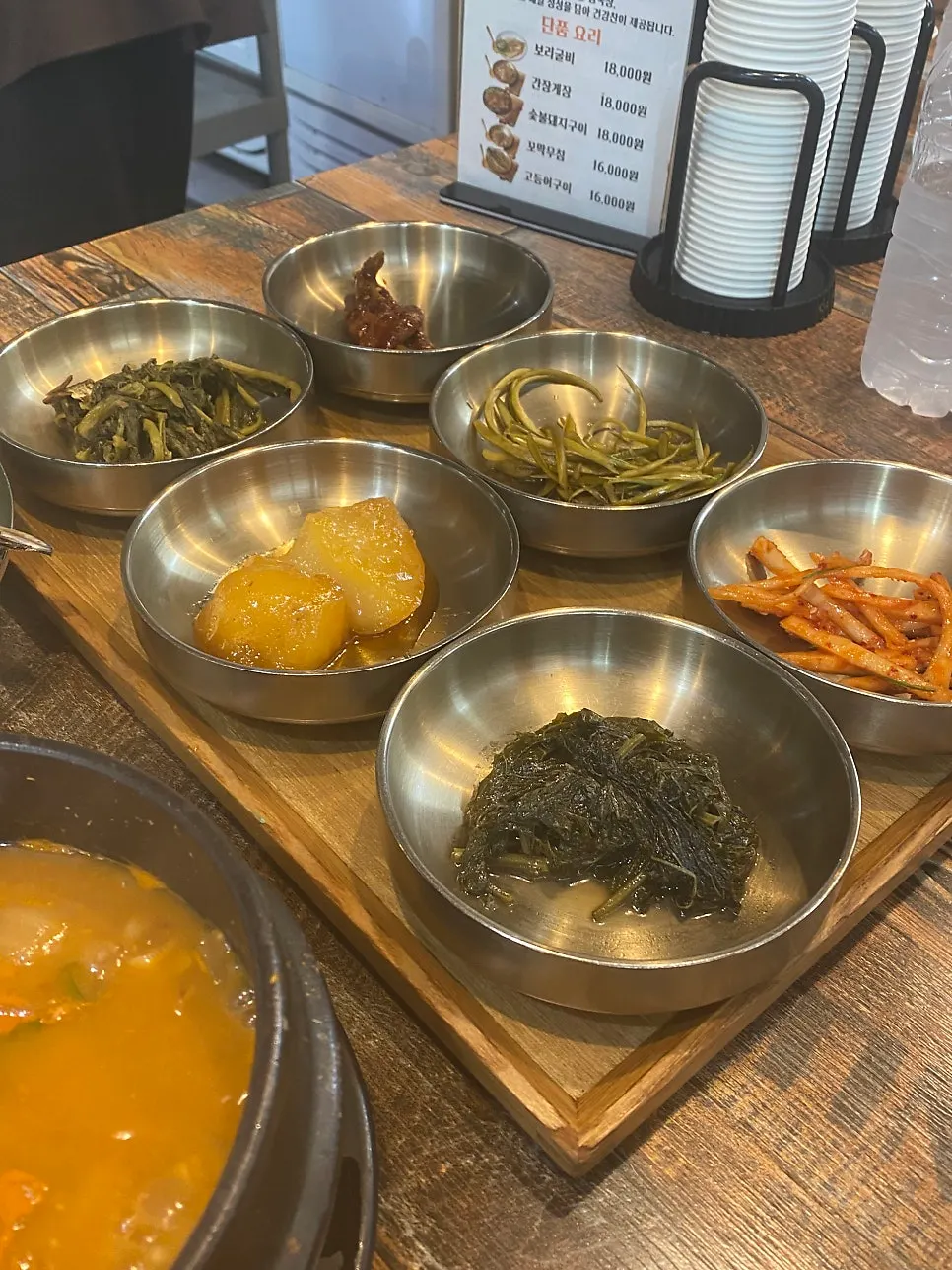 Homemade banchan including dried radish greens and pickles
