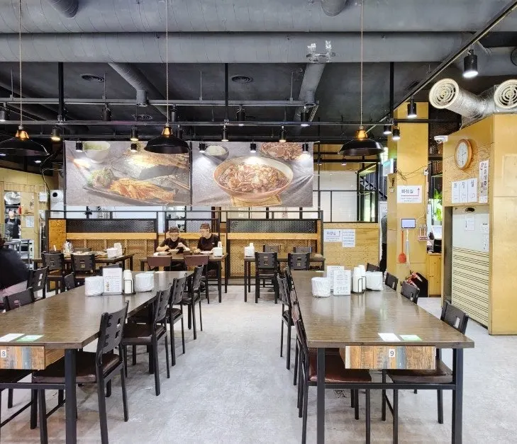 Entrance of the 2nd floor restaurant with Wonmisan trees visible
