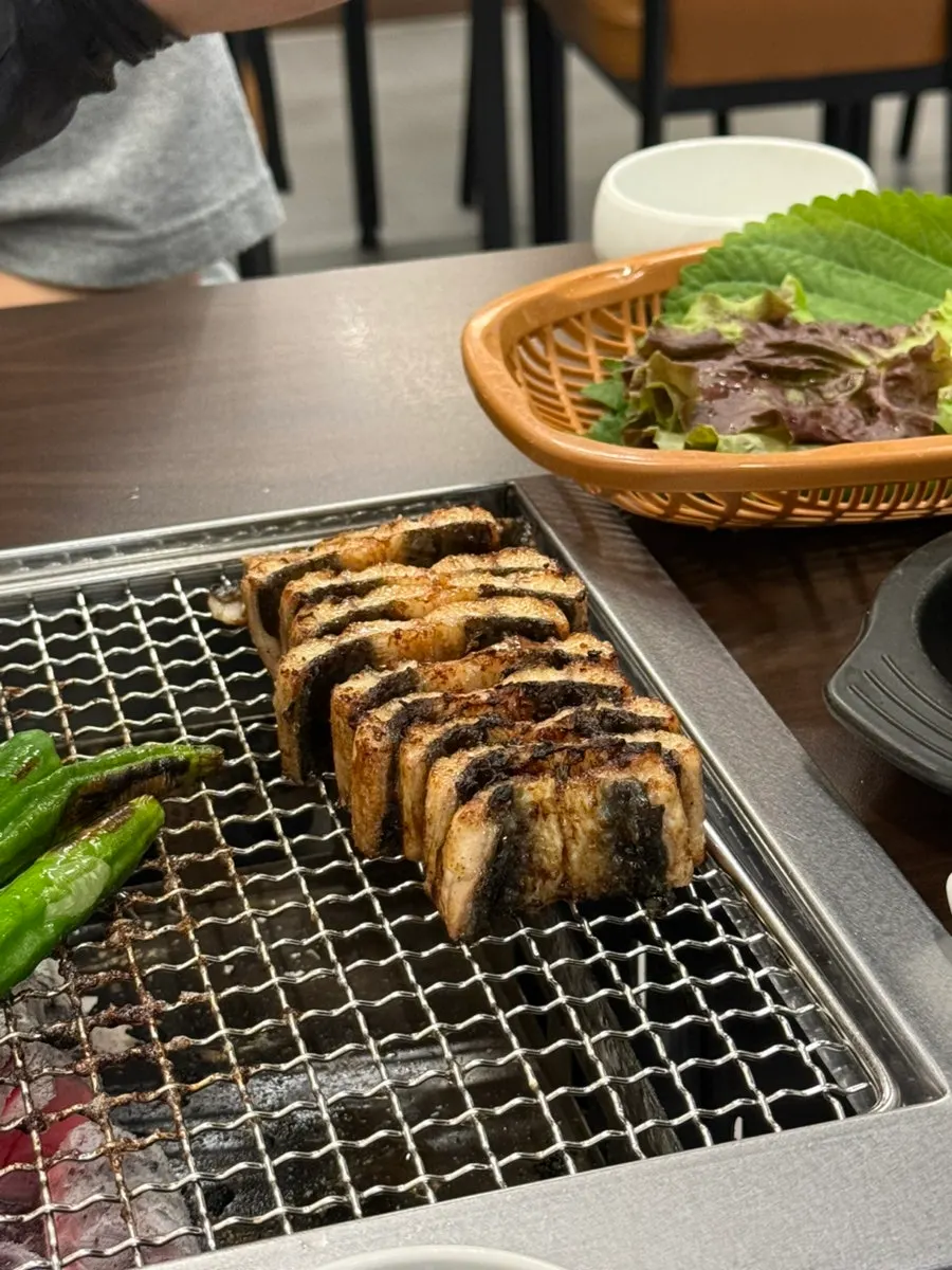 Grilled eel cut into bite-size pieces
