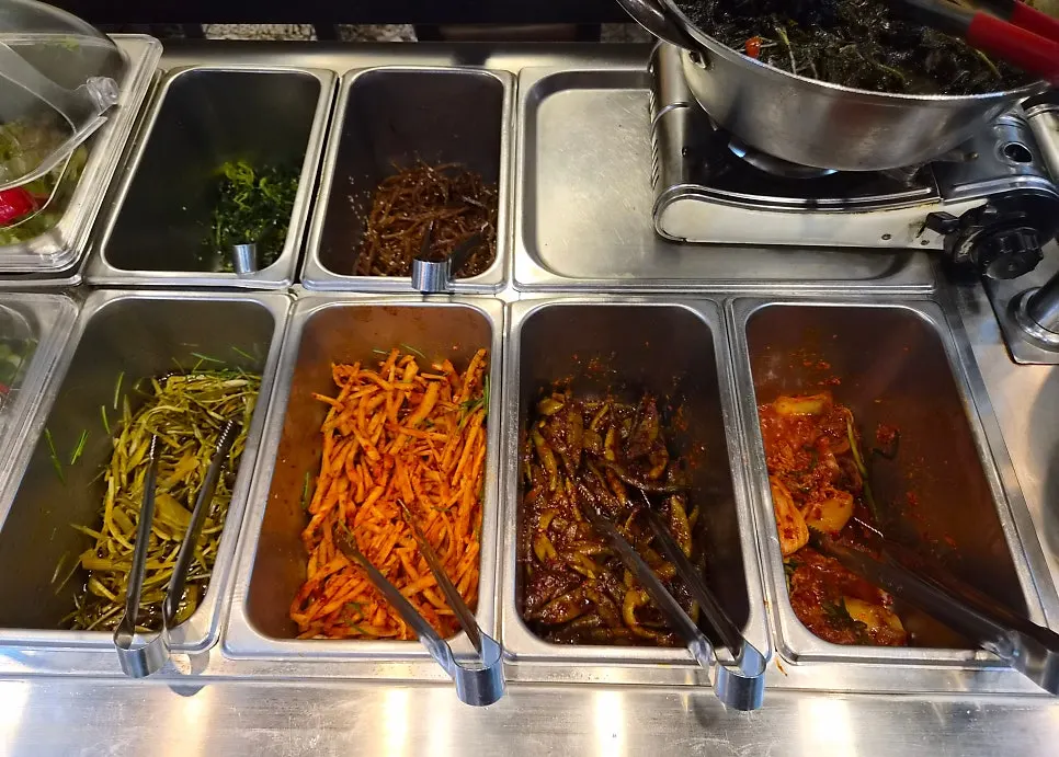 Self-service corner for rice and side dishes