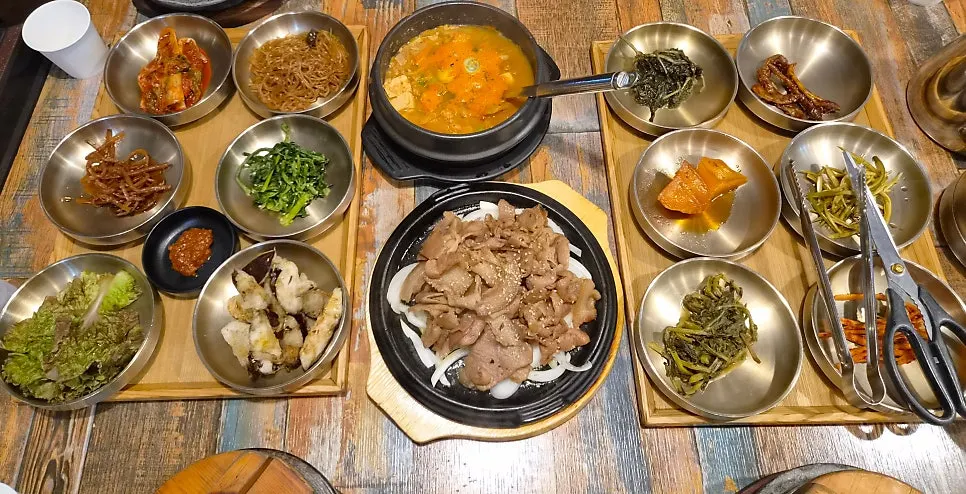 Korean set meal spread with assorted side dishes