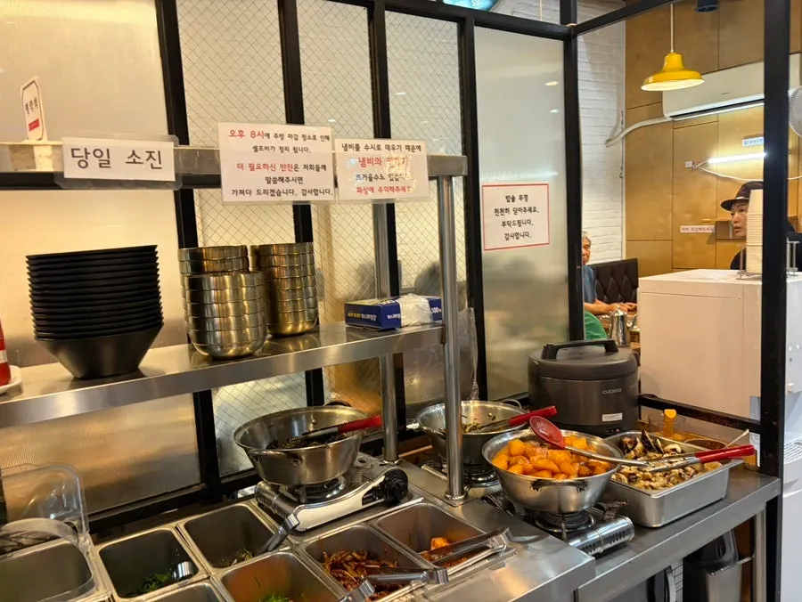 Self-bar where you can help yourself to unlimited banchan