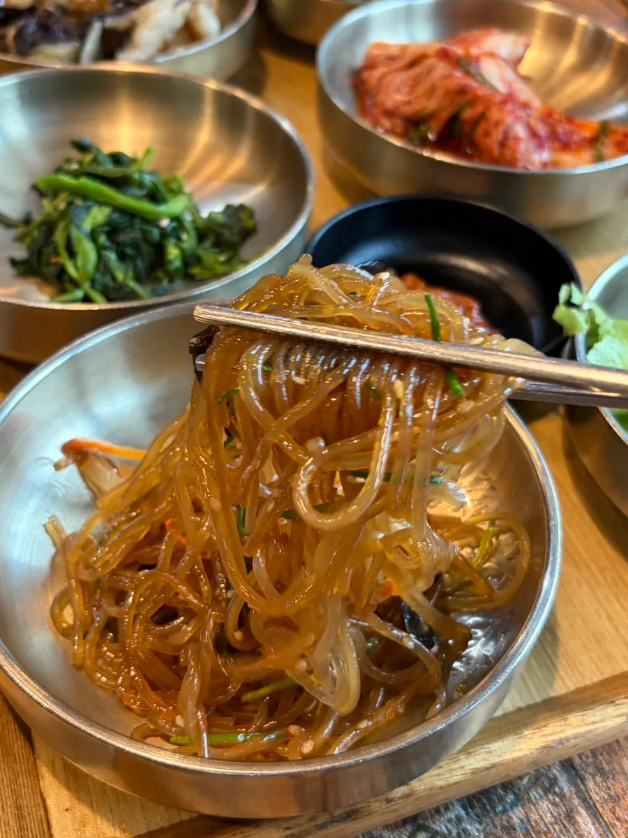 Bowls of side dishes made with seasonal ingredients