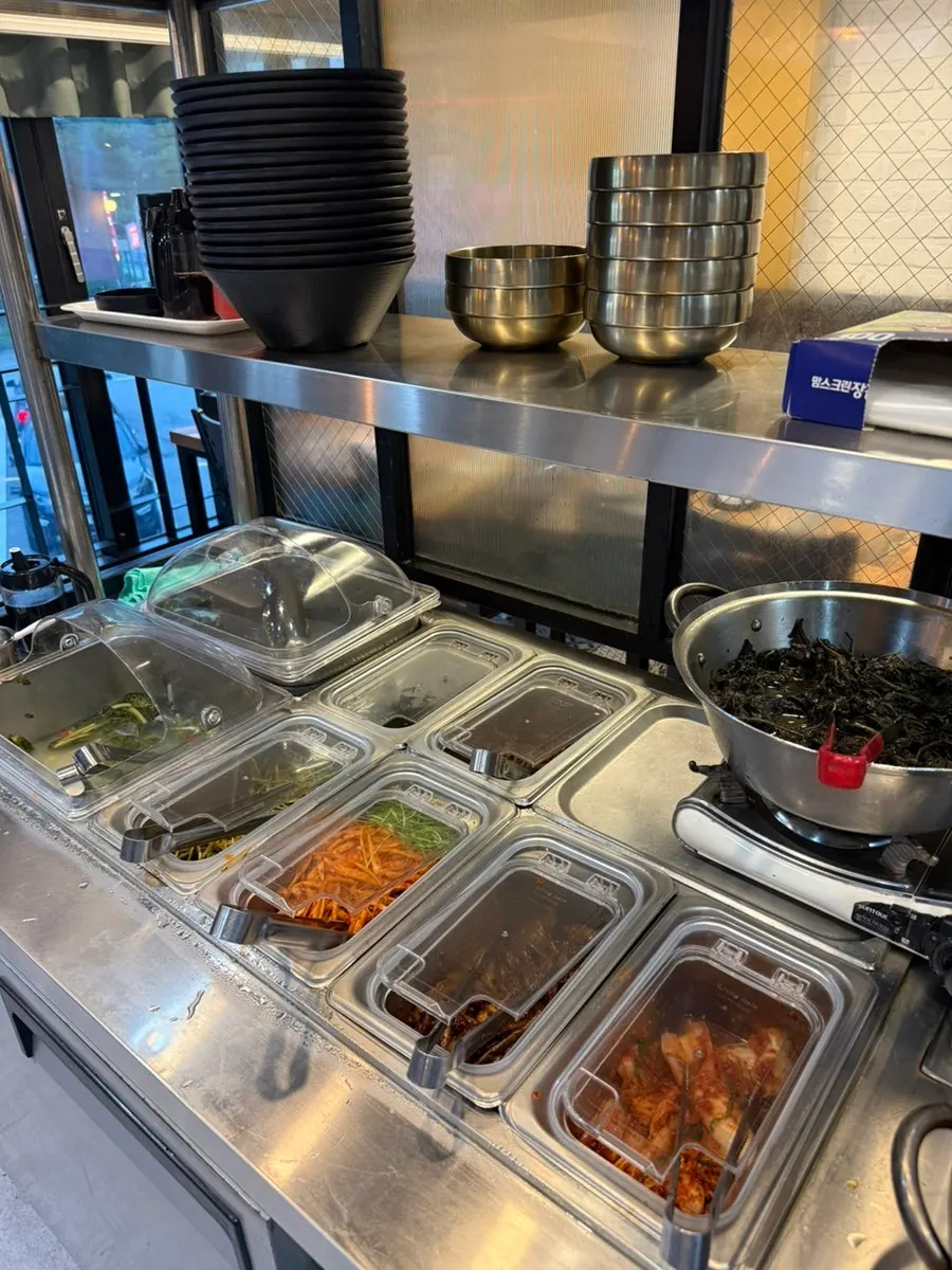 Containers of banchan at the self-bar