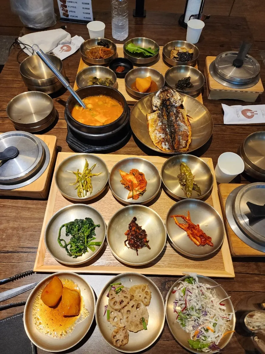A Korean table meal fully set with side dishes